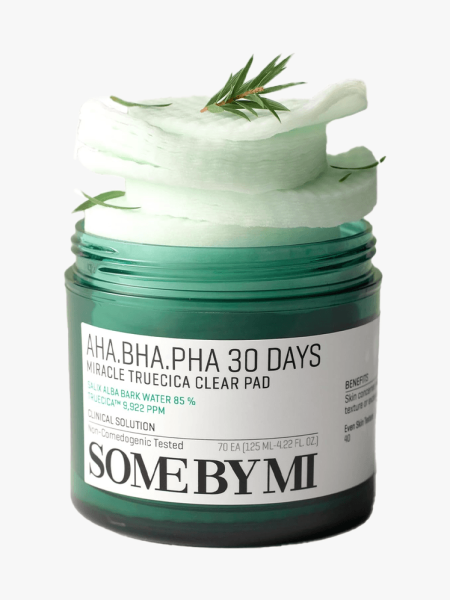 Some by Mi AHA BHA PHA 30 Days Miracle Truecica Clear Pad in branded tub component on a light gray background